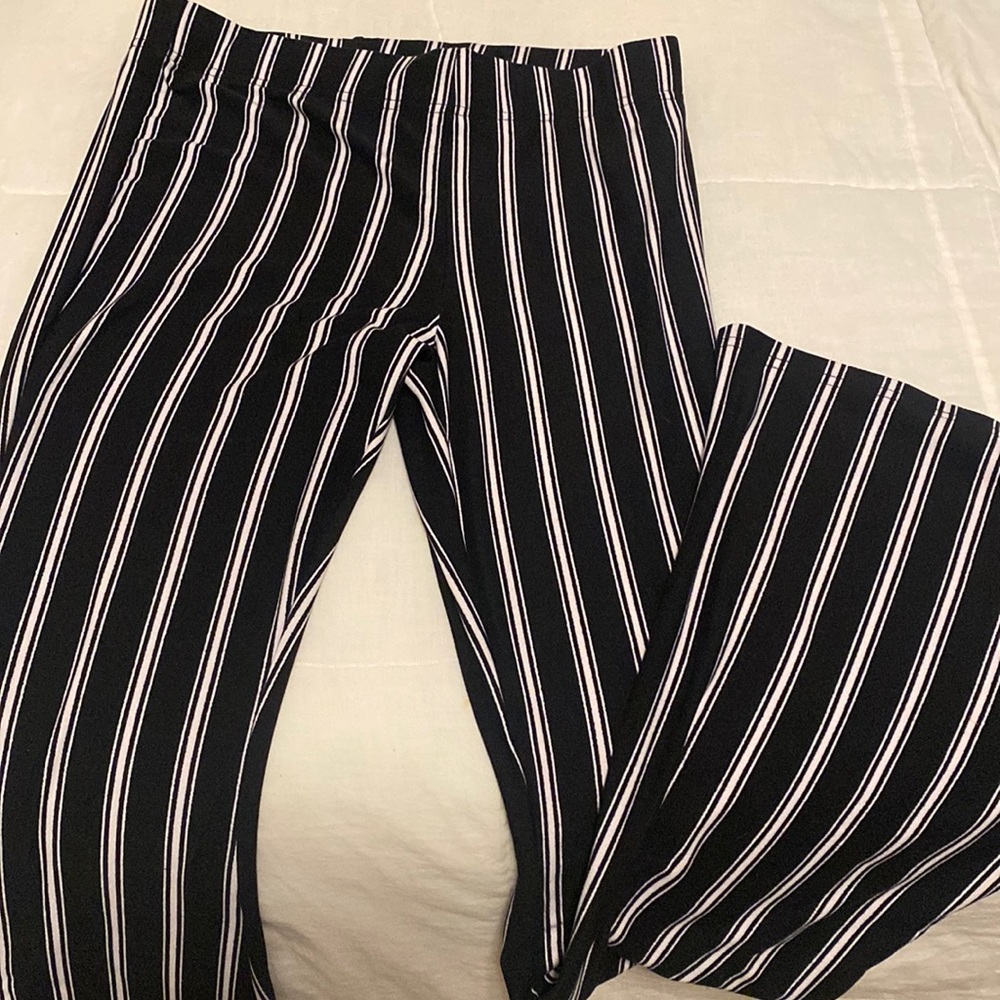 black and white striped stretchy pants, bottoms flare out